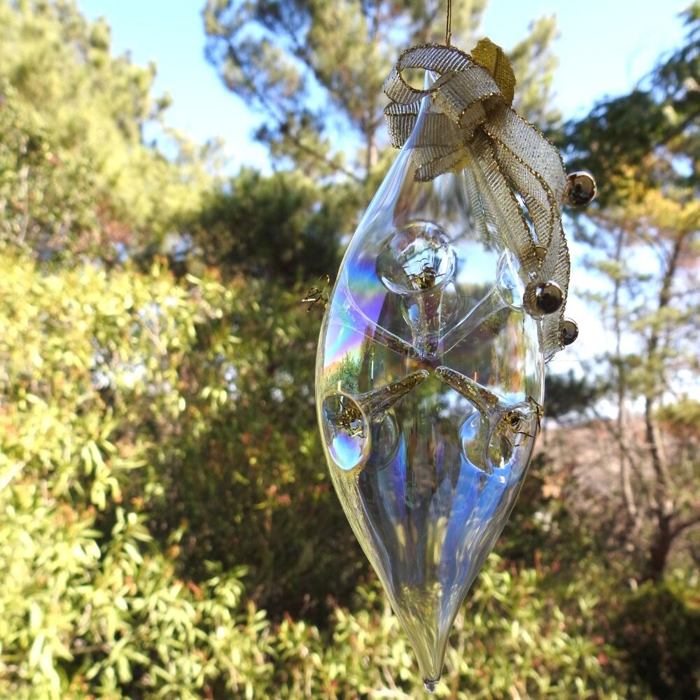 Clear Iridescent Mouth Blown Glass Icicle With Golden Embellishments